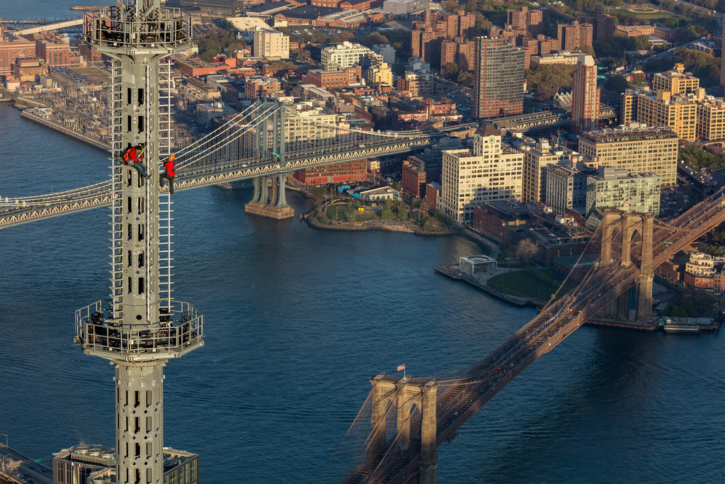 man on spire new york times