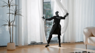 Robot Unitree qui pouvre les rideaux de la fenêtre