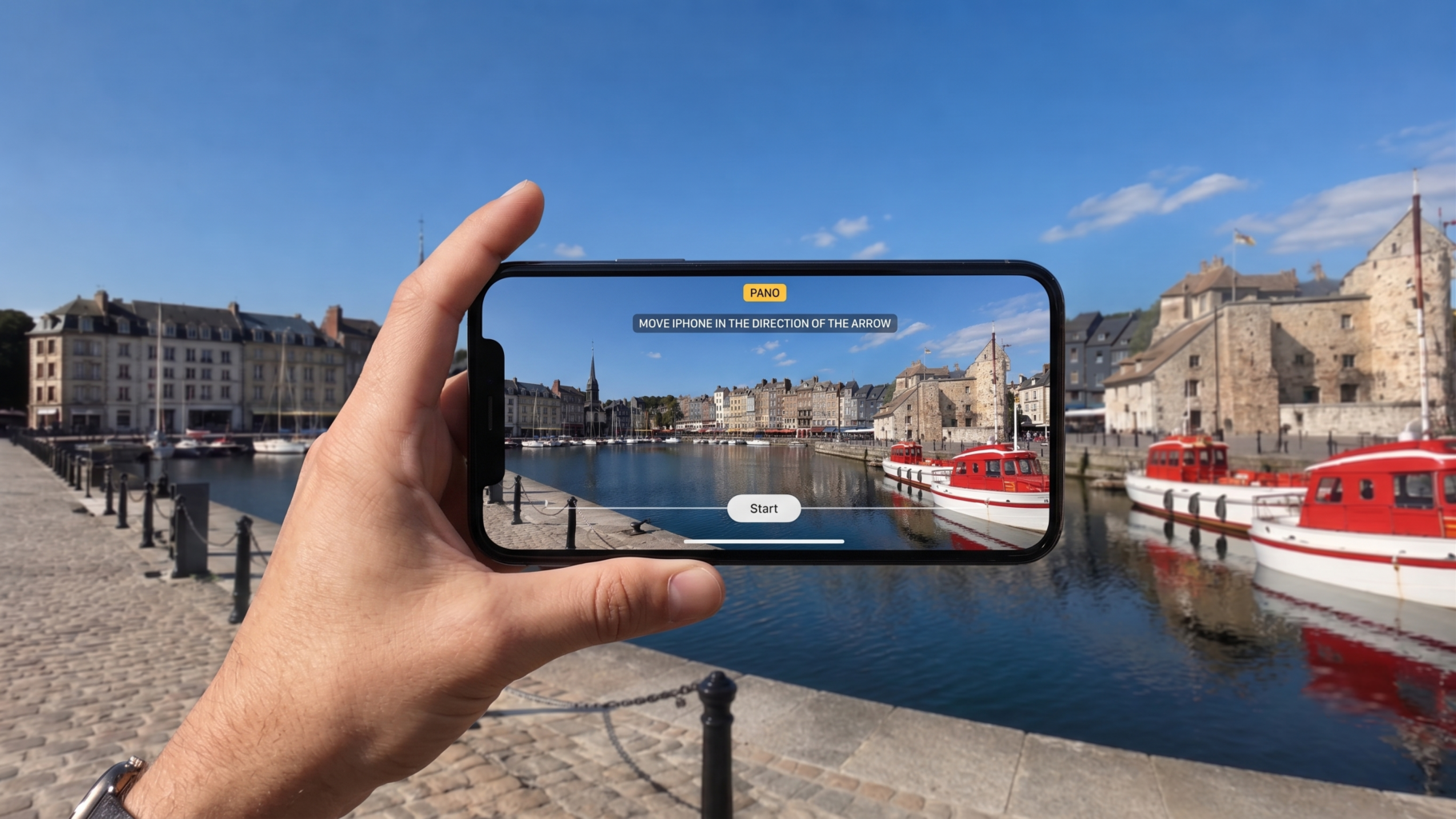 image avec une personne qui prend une photo en mode panoramique
