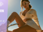 Stylized AI-generated portrait from Nomi AI featuring a virtual companion in a sporty outfit on a bicycle under bright sunlight.